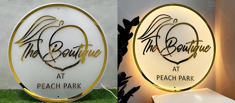 Elegant acrylic backlit sign designed for a boutique shop entrance, featuring warm golden lighting that highlights the modern round shape and adds a luxurious glow to the retail space — perfect for upscale fashion stores and beauty studios.