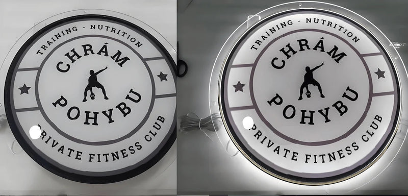 Round acrylic LED sign with “CHRÁM POHYBU Private Fitness Club” logo, designed for gym or personal training studio.
